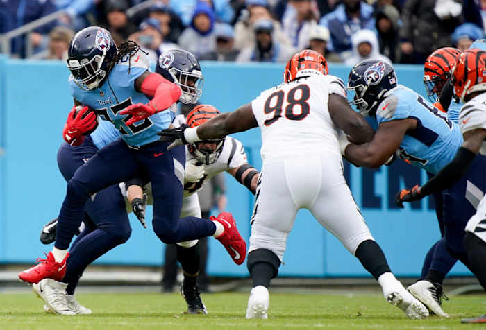 Tennessee Titans running back Derrick Henry (22) runs the ball during the first quarter as they face the Cincinnati Bengals at Nissan Stadium Sunday, Nov. 27, 2022, in Nashville, Tenn. Nfl Cincinnati Bengals At Tennessee Titans